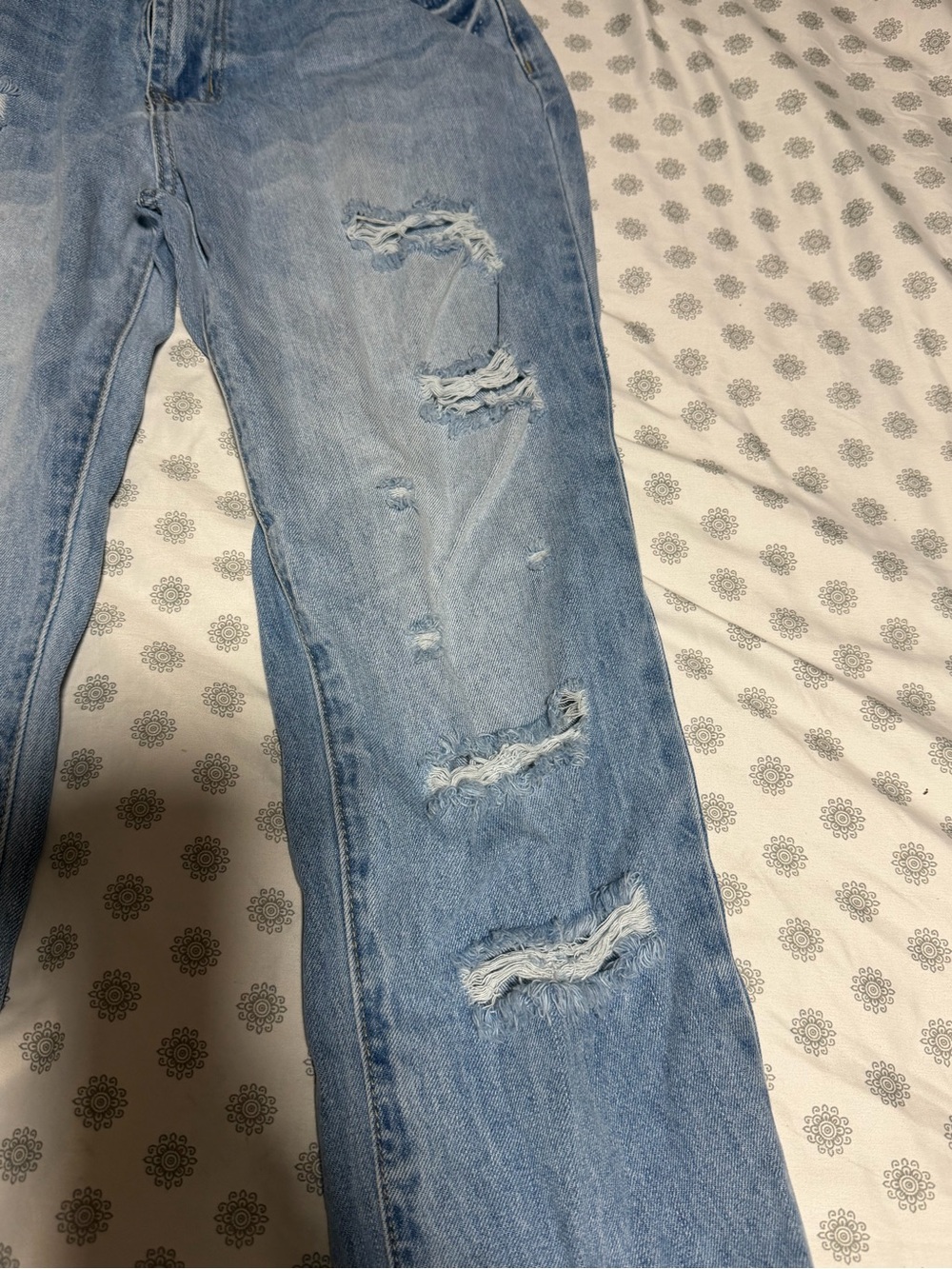 Women's Light Blue Distressed Jeans